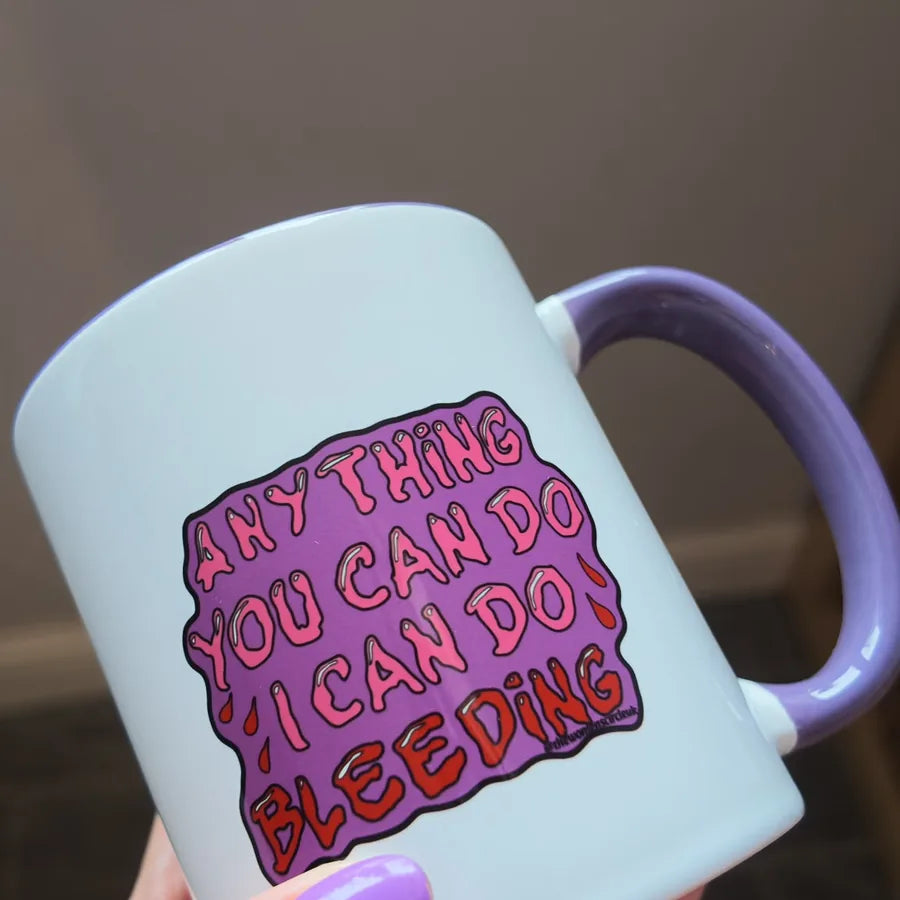 The Bleeding One mug held in hand