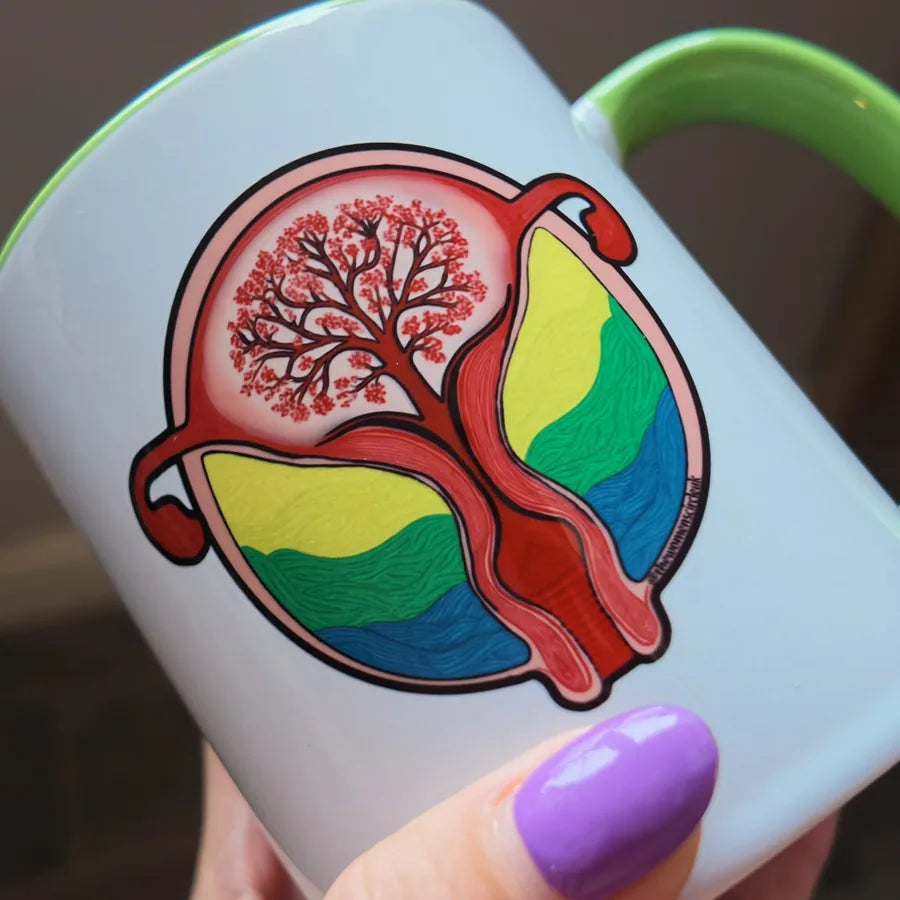 The Bloom One mug held in hand