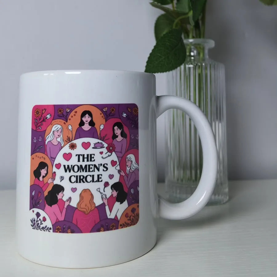White mug printed with The Women's Circle illustration