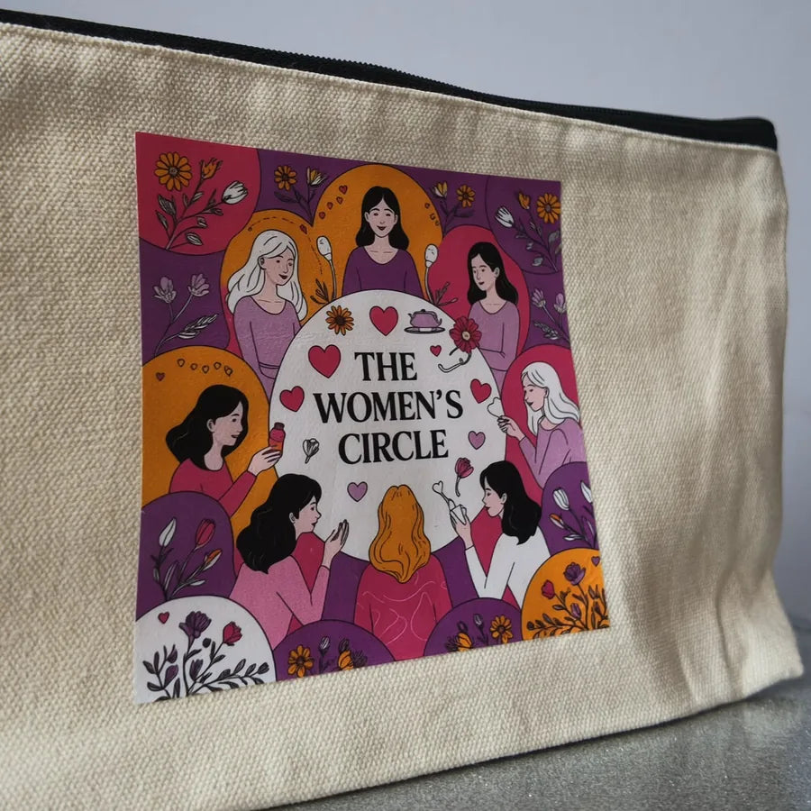 Natural canvas zip makeup bag printed with The Women's Circle illustration